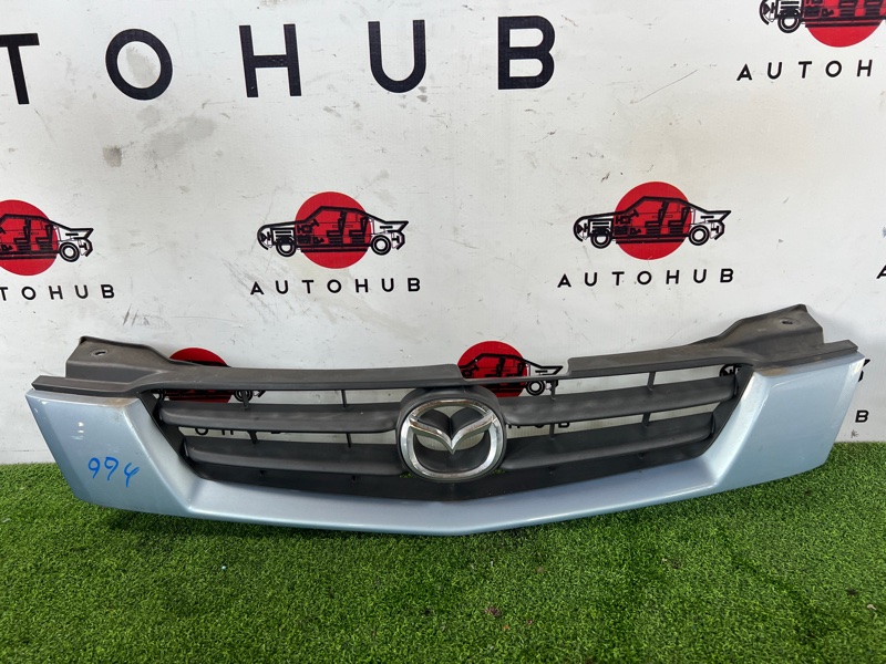 решетка радиатора - Mazda Demio